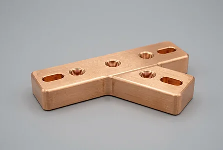 Precision machined copper electrical connector and busbar component