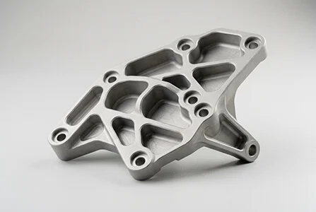 CNC machined magnesium aerospace bracket with weight reduction pockets