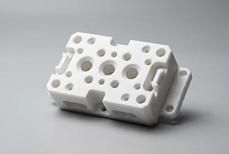 Machined plastic insulator or wear component