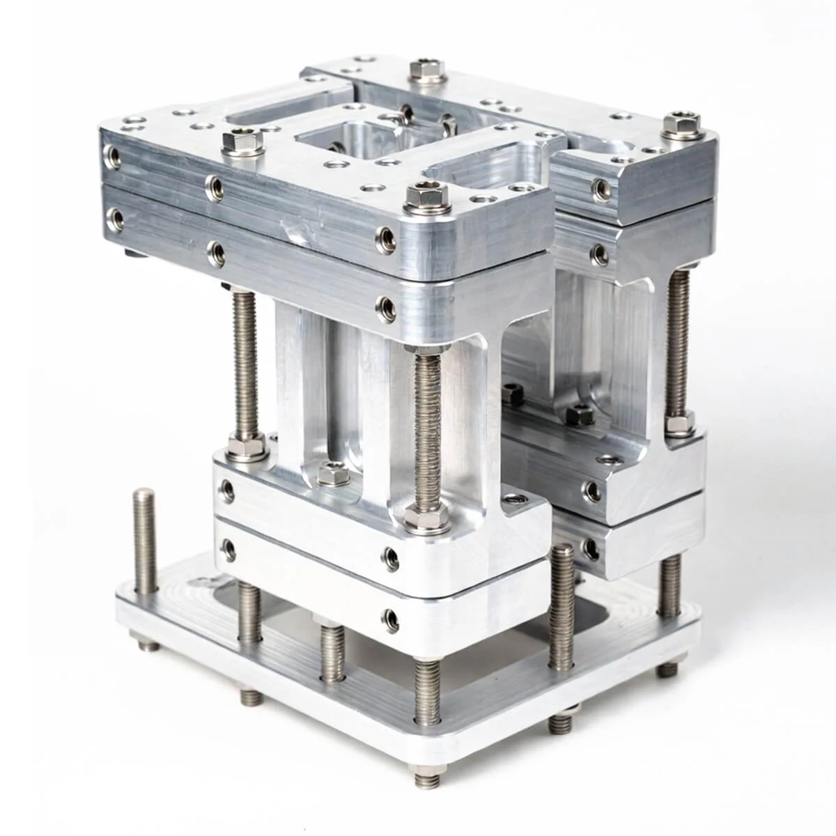 Sub-assemblies combining machined parts + inserts + fasteners